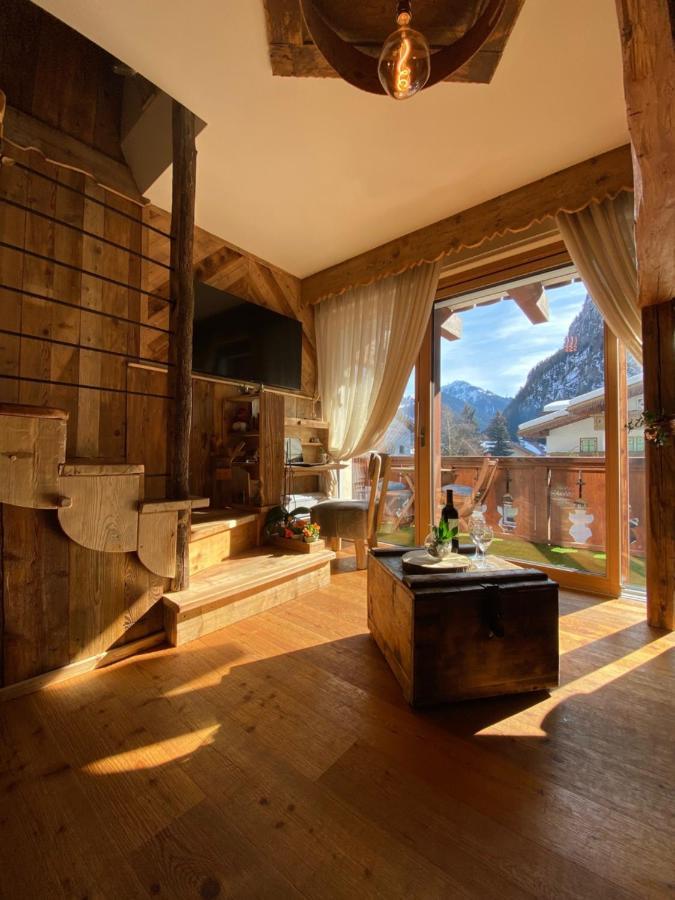 Calore Di Una Casa Di Montagna Кампителло-ди-Фасса Экстерьер фото