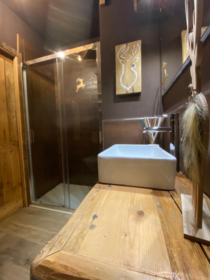 Calore Di Una Casa Di Montagna Кампителло-ди-Фасса Экстерьер фото